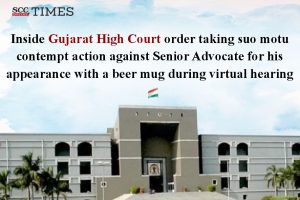 senior advocate drinking from beer mug